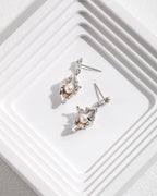 [Conque] Boucles d'oreilles/collier en perles d'argent pur